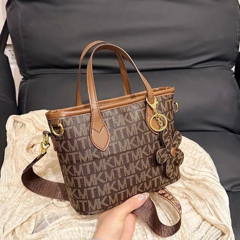 Stylish Monogram Crossbody Bag: Mini Tote with Charm