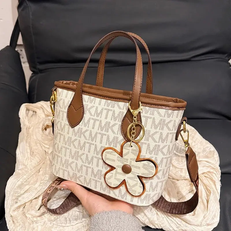 Stylish Monogram Crossbody Bag: Mini Tote with Charm