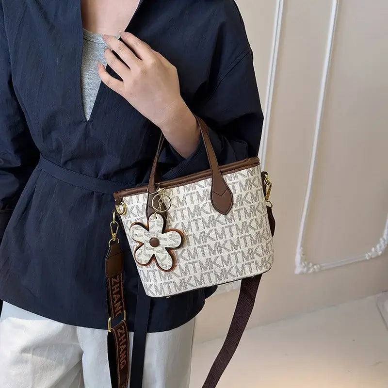 Stylish Monogram Crossbody Bag: Mini Tote with Charm